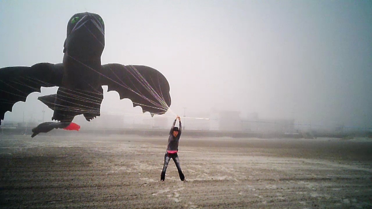 A giant dragon kite being launched