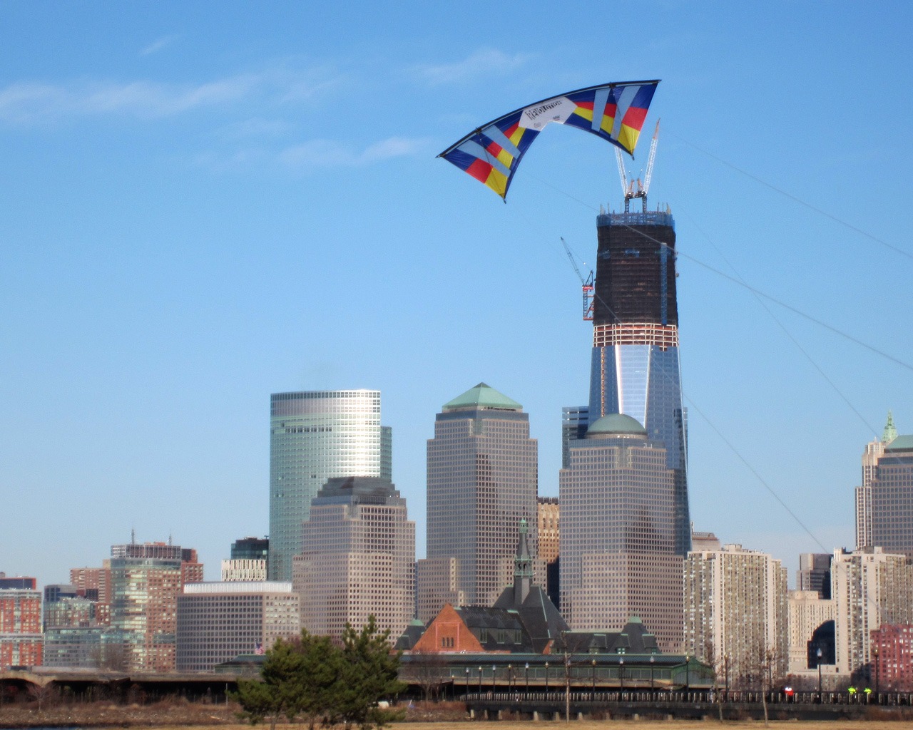 A kite flying over the city